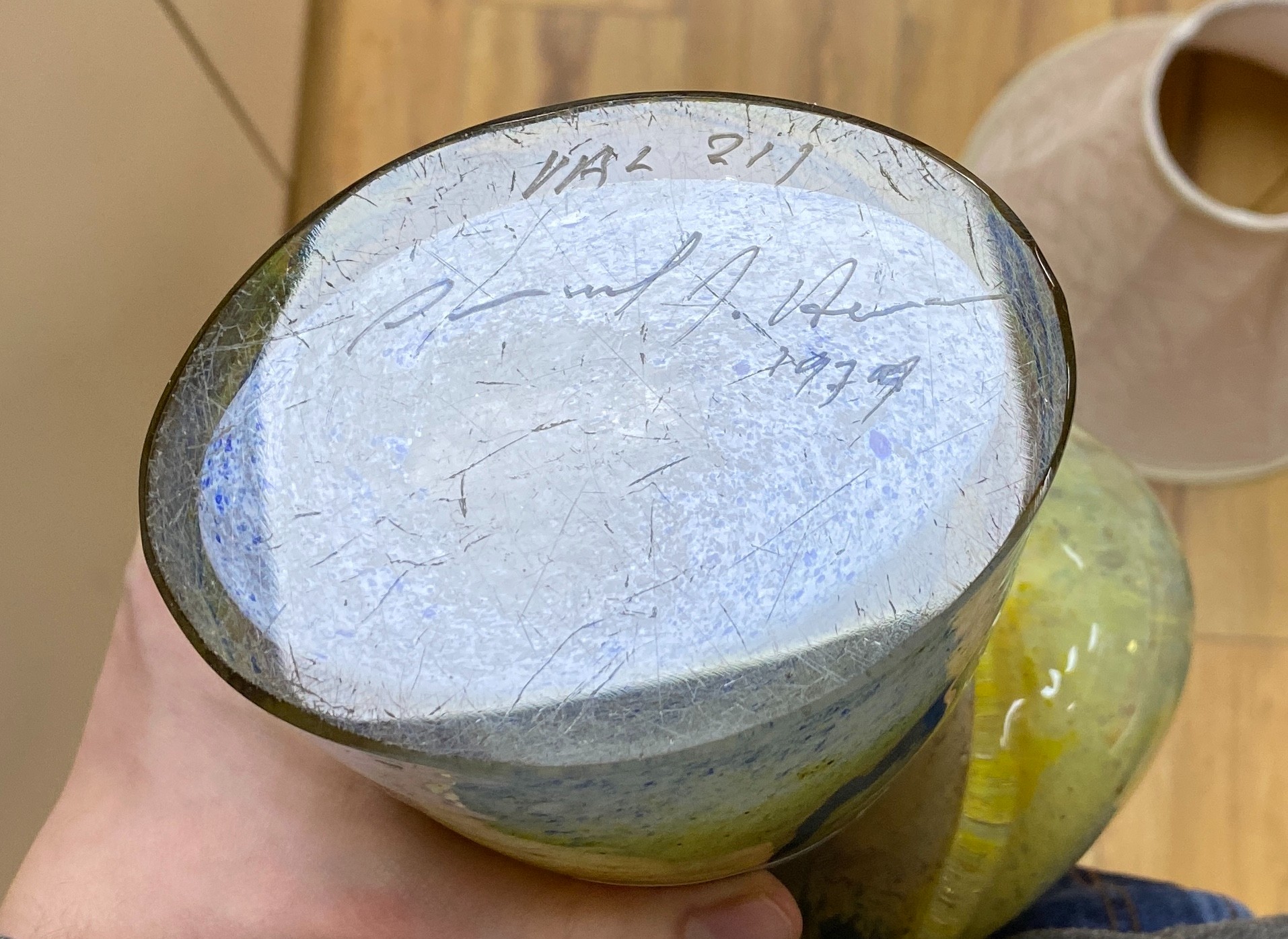 A Sam Herman studio glass vase, with catalogue, 37cms high